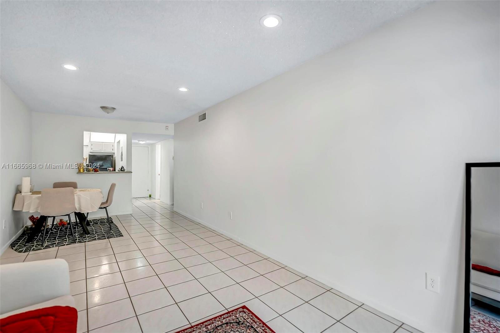 4111 Stirling Road, Unit 304 Fort Lauderdale, FL 33314 - Photo 6 of 22 a living room with furniture