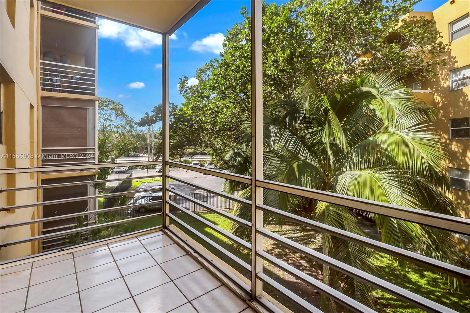 4111 Stirling Road, Unit 304 Fort Lauderdale, FL 33314 - Photo 7 of 22 a view of outdoor space with seating area
