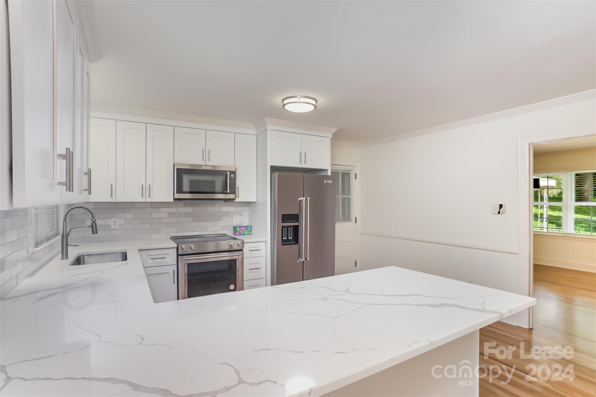 926 Shady Bluff Drive Charlotte, NC 28211 - Photo 13 of 44 a kitchen with stainless steel appliances granite countertop a refrigerator sink and stove