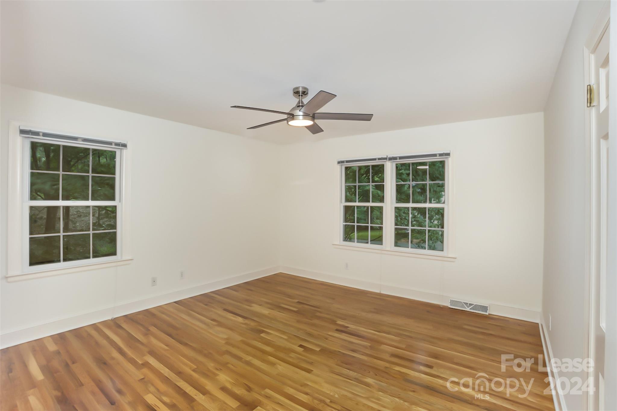 926 Shady Bluff Drive Charlotte, NC 28211 - Photo 33 of 44 an empty room with a window