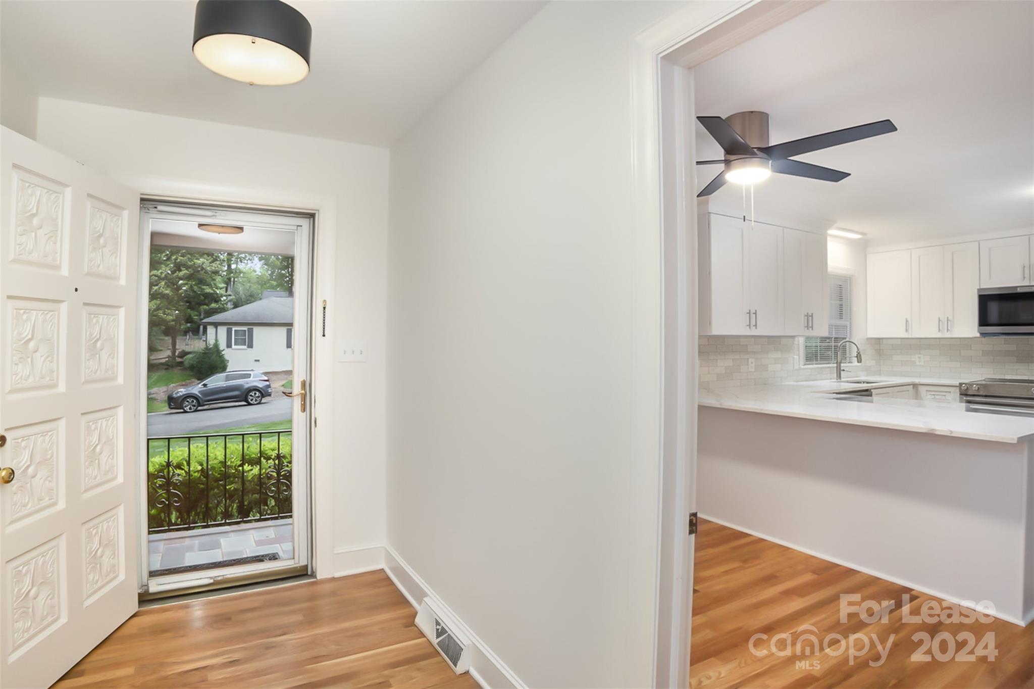 926 Shady Bluff Drive Charlotte, NC 28211 - Photo 34 of 44 a view of a kitchen from the hallway