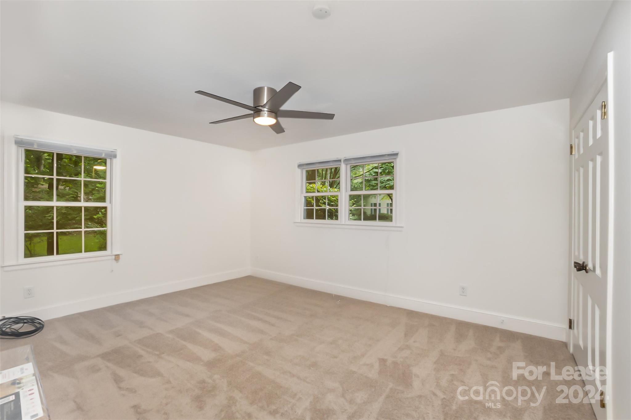926 Shady Bluff Drive Charlotte, NC 28211 - Photo 37 of 44 an empty room with a window