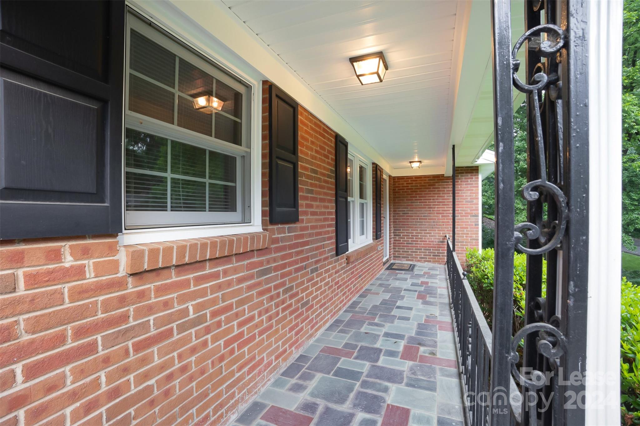 926 Shady Bluff Drive Charlotte, NC 28211 - Photo 4 of 44 a view of a entryway door of the house