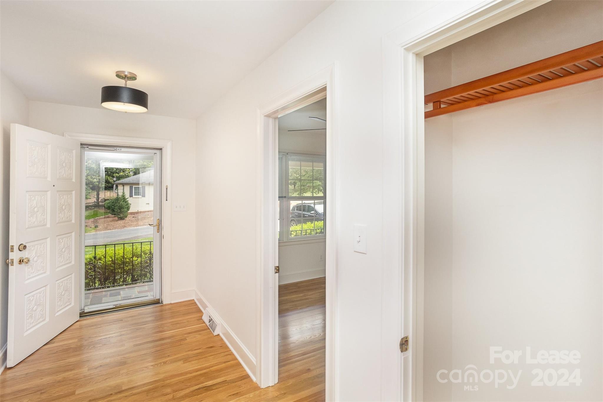 926 Shady Bluff Drive Charlotte, NC 28211 - Photo 5 of 44 a view of entryway with wooden floor