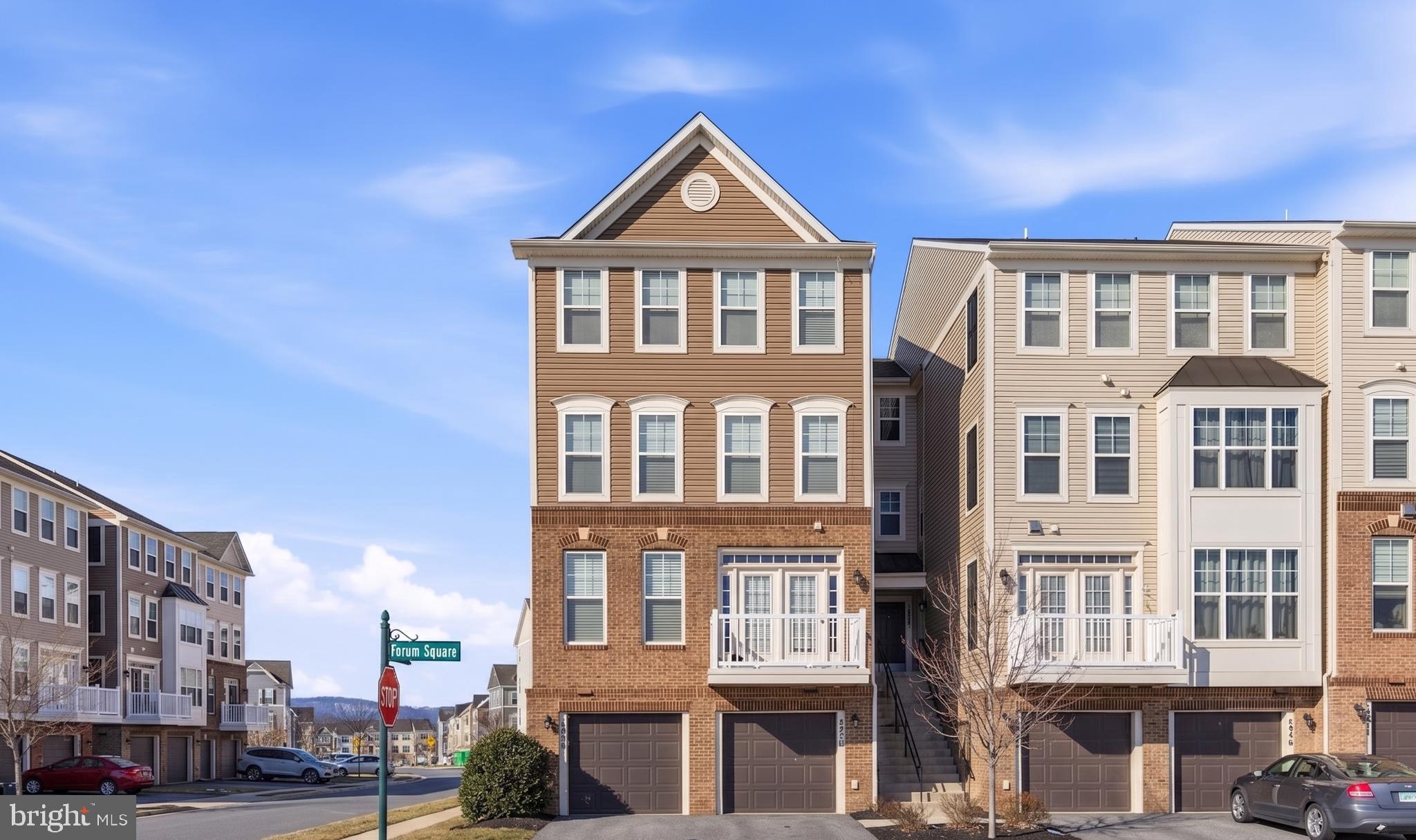 5902 Forum Square Frederick, MD 21703 - Photo 1 of 28 a front view of a building with a lot of windows
