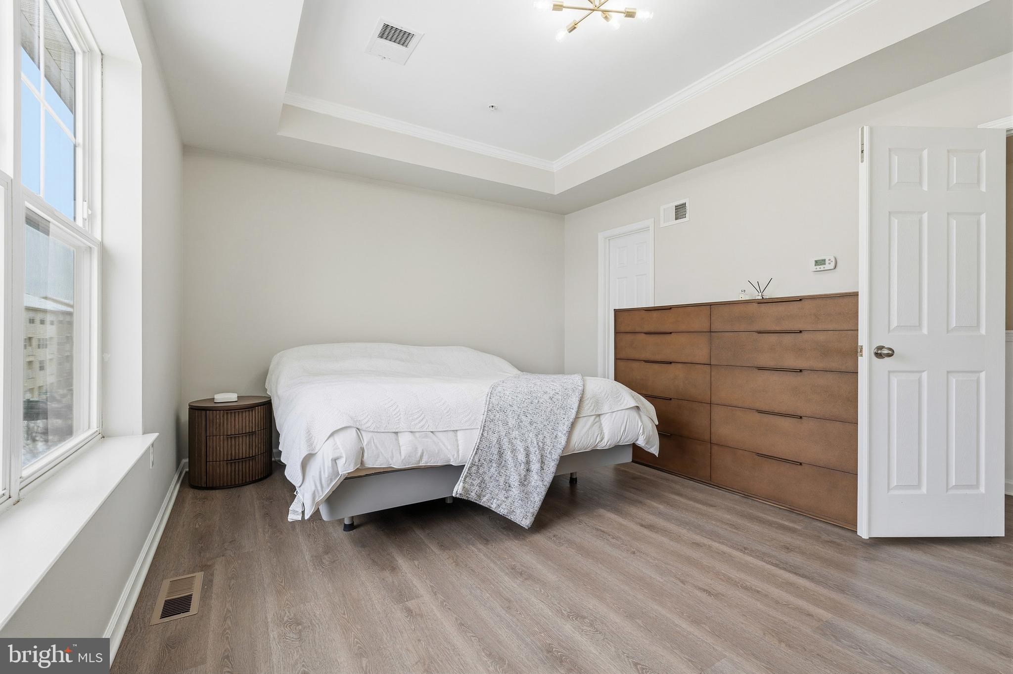 5902 Forum Square Frederick, MD 21703 - Photo 19 of 28 a bedroom with a bed and a window