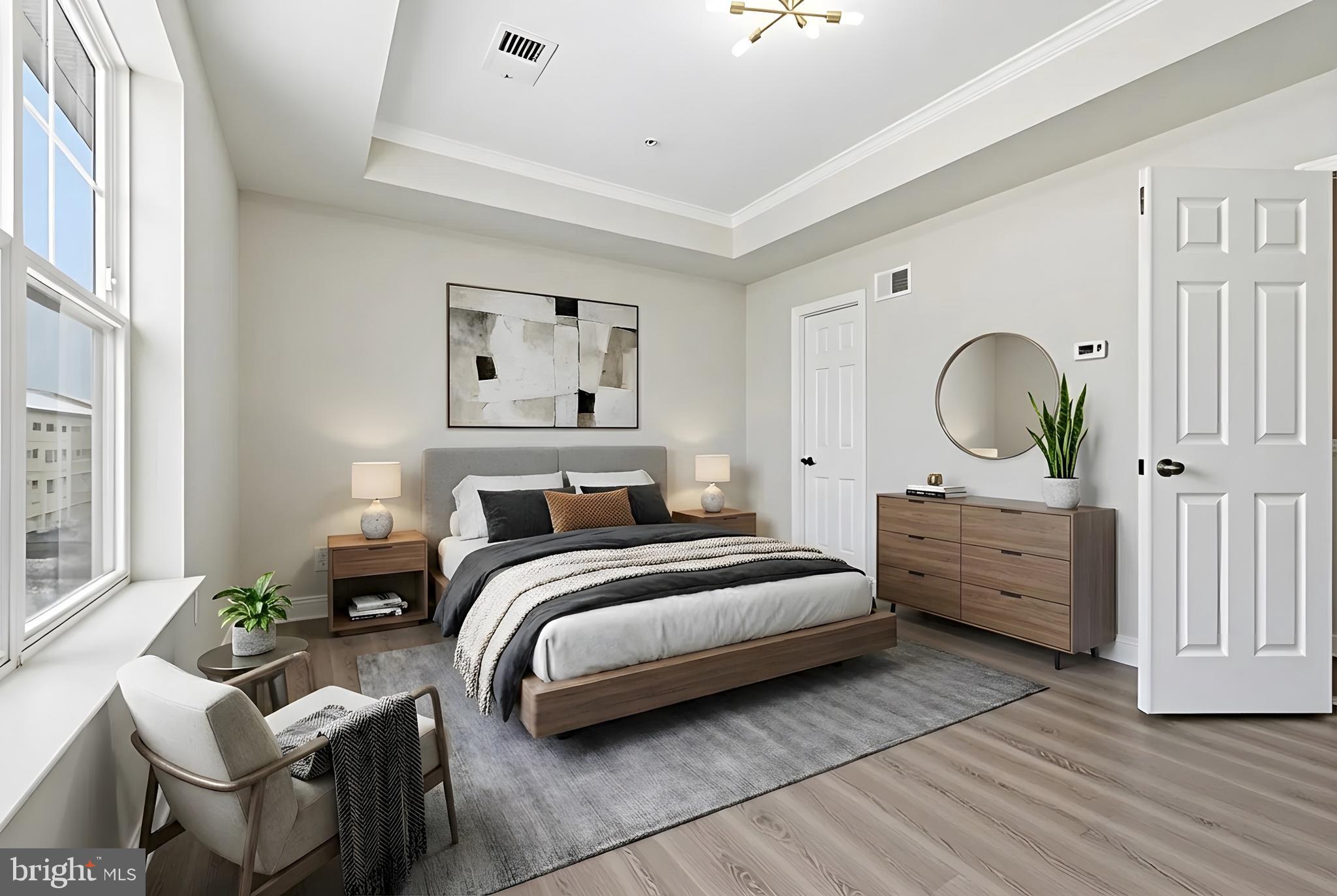 5902 Forum Square Frederick, MD 21703 - Photo 20 of 28 a bed room with bed and a painting