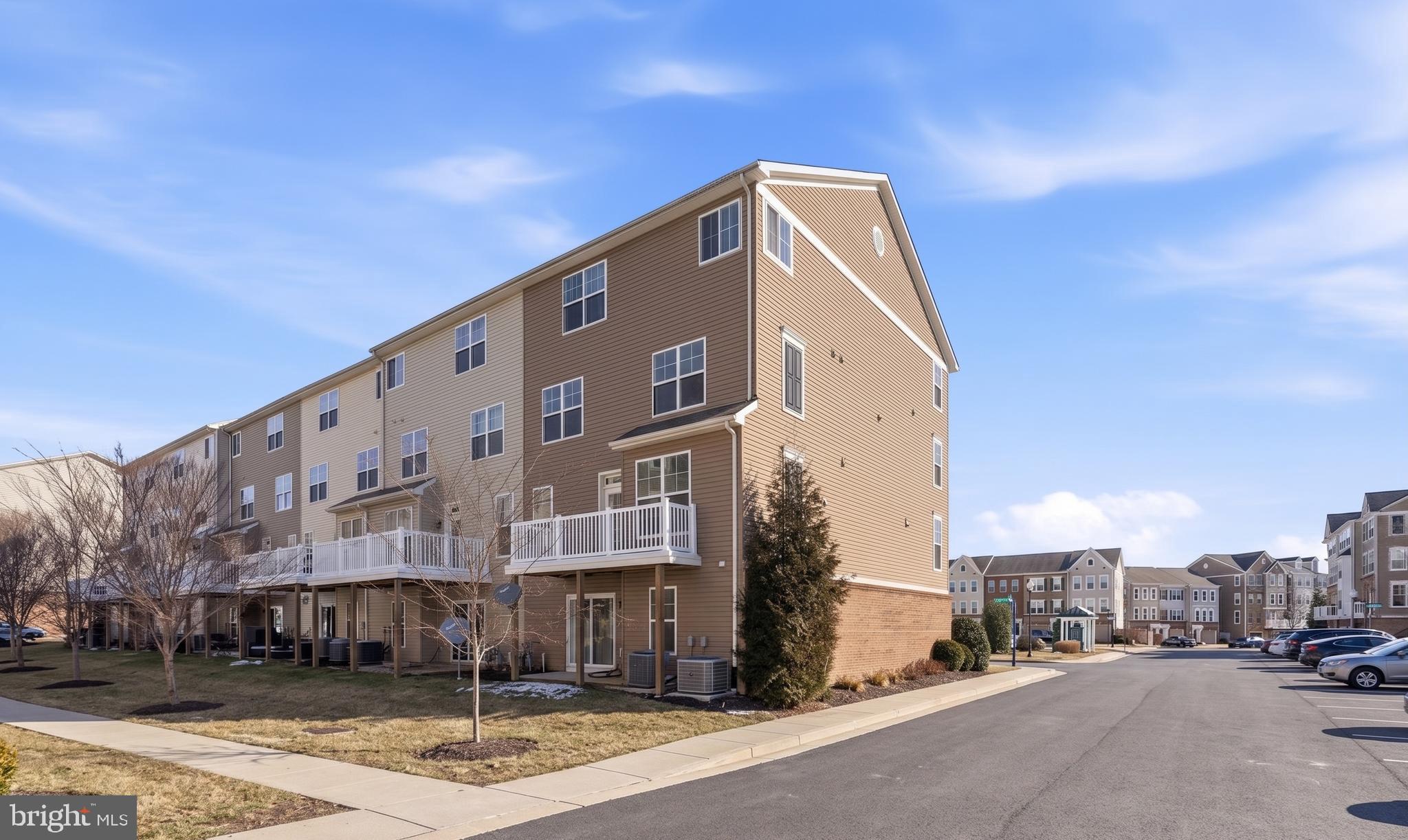 5902 Forum Square Frederick, MD 21703 - Photo 26 of 28 a front view of a building with street view