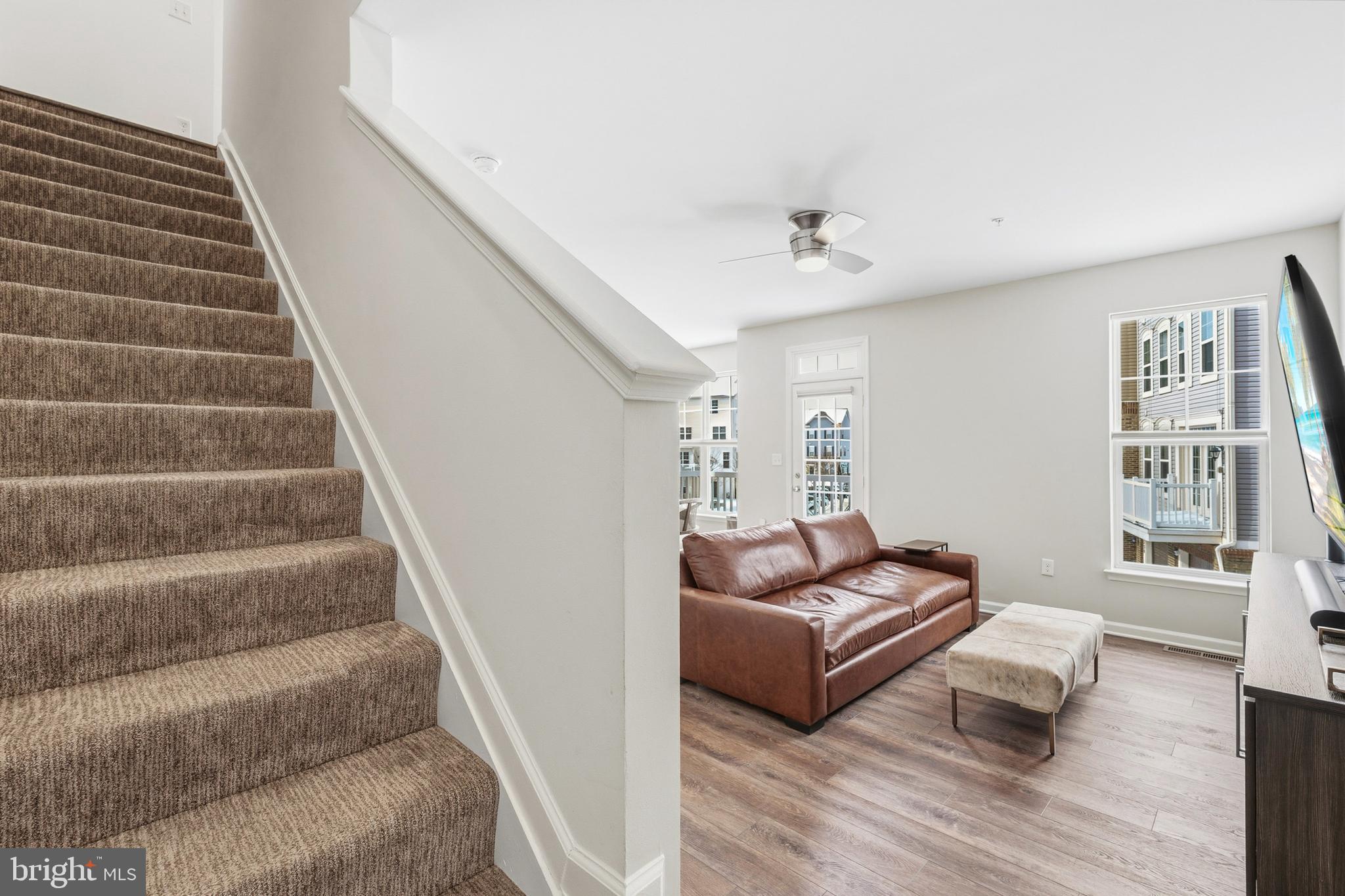 5902 Forum Square Frederick, MD 21703 - Photo 3 of 28 a living room with furniture and a wooden floor