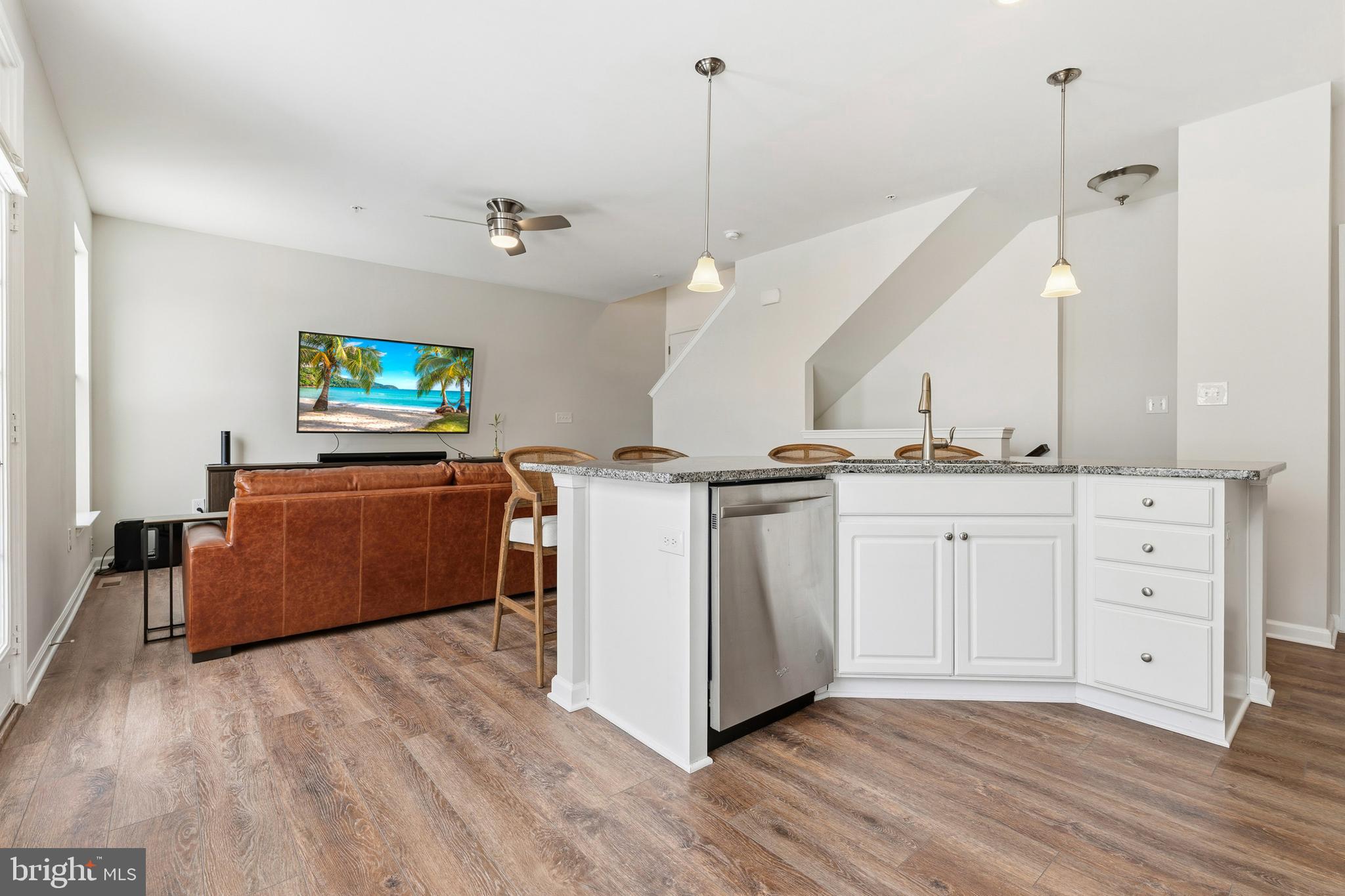 5902 Forum Square Frederick, MD 21703 - Photo 5 of 28 a room with cabinets and wooden floor