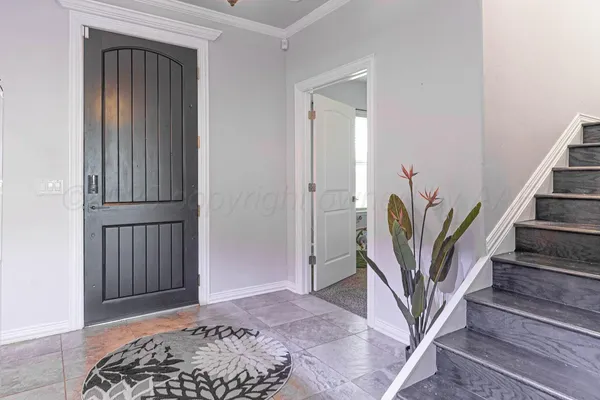 a view of entryway with wooden floor