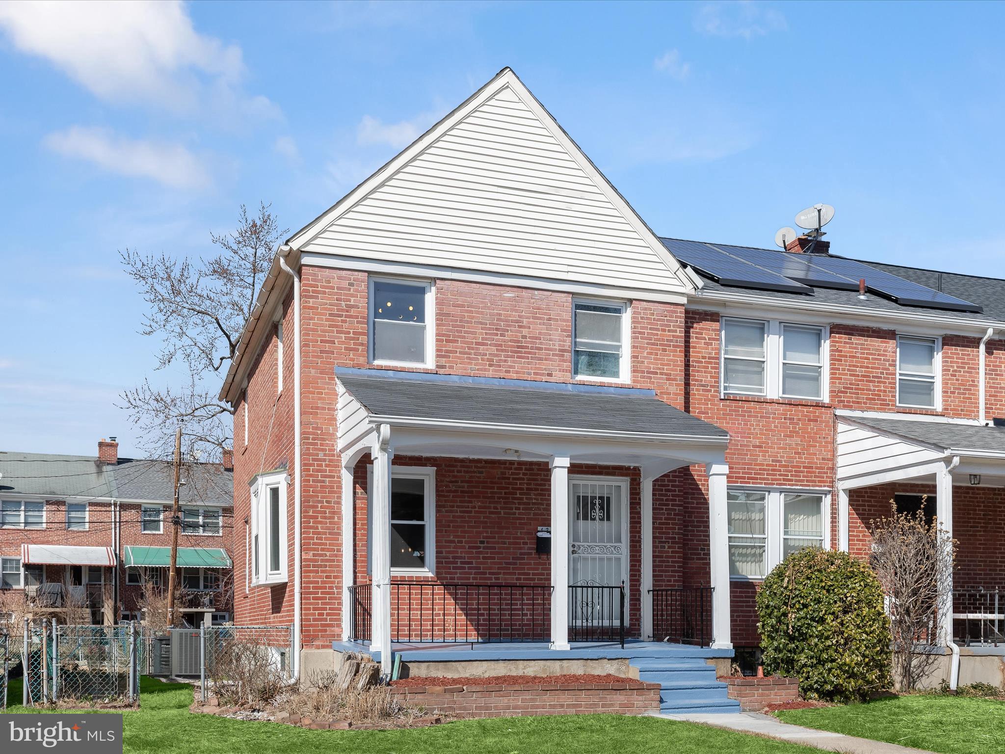 1350 Pentwood Road Baltimore, MD 21239 - Photo 1 of 37 a front view of a house with garden