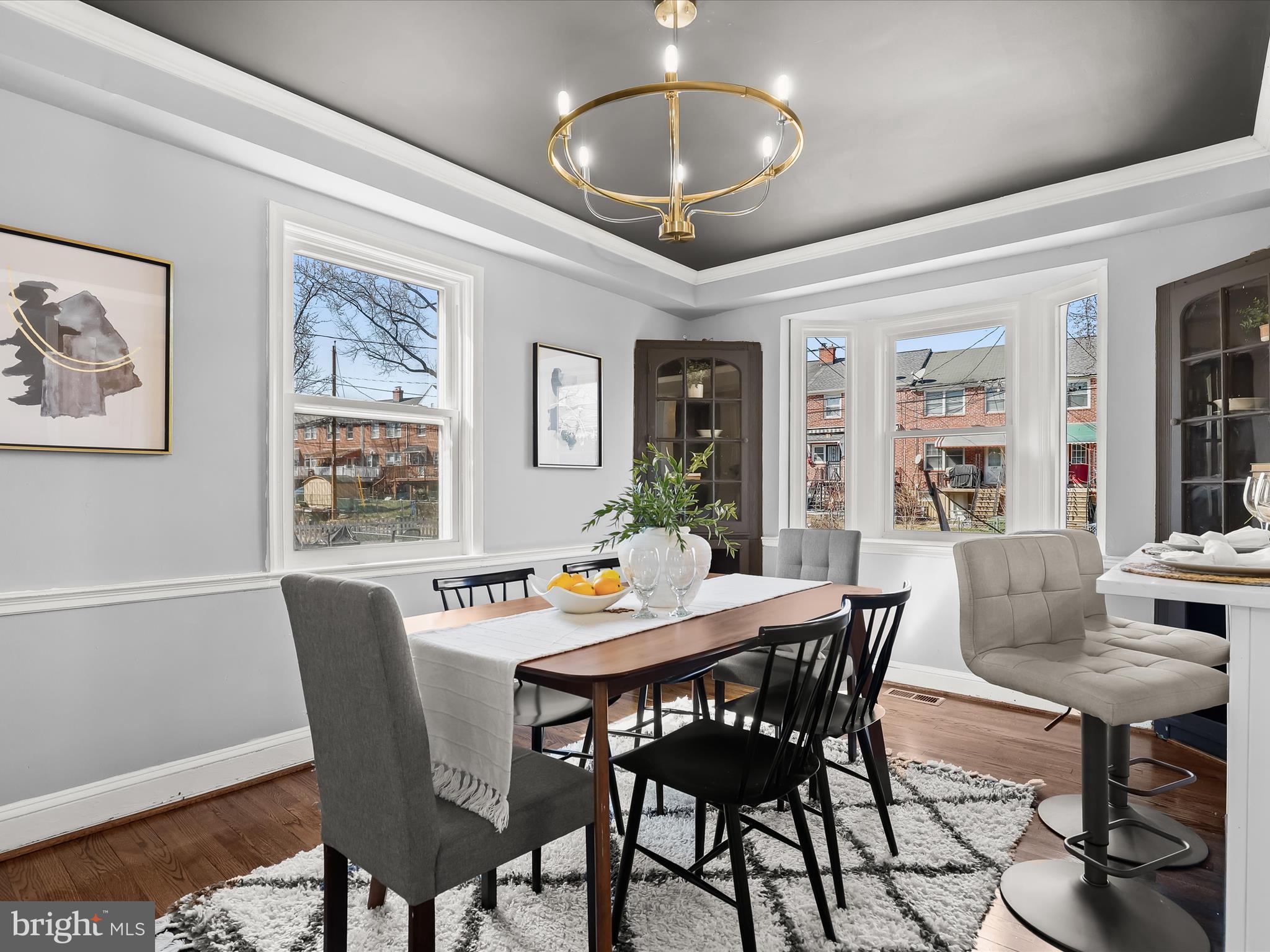 1350 Pentwood Road Baltimore, MD 21239 - Photo 11 of 37 a view of a dining room with furniture window and wooden floor