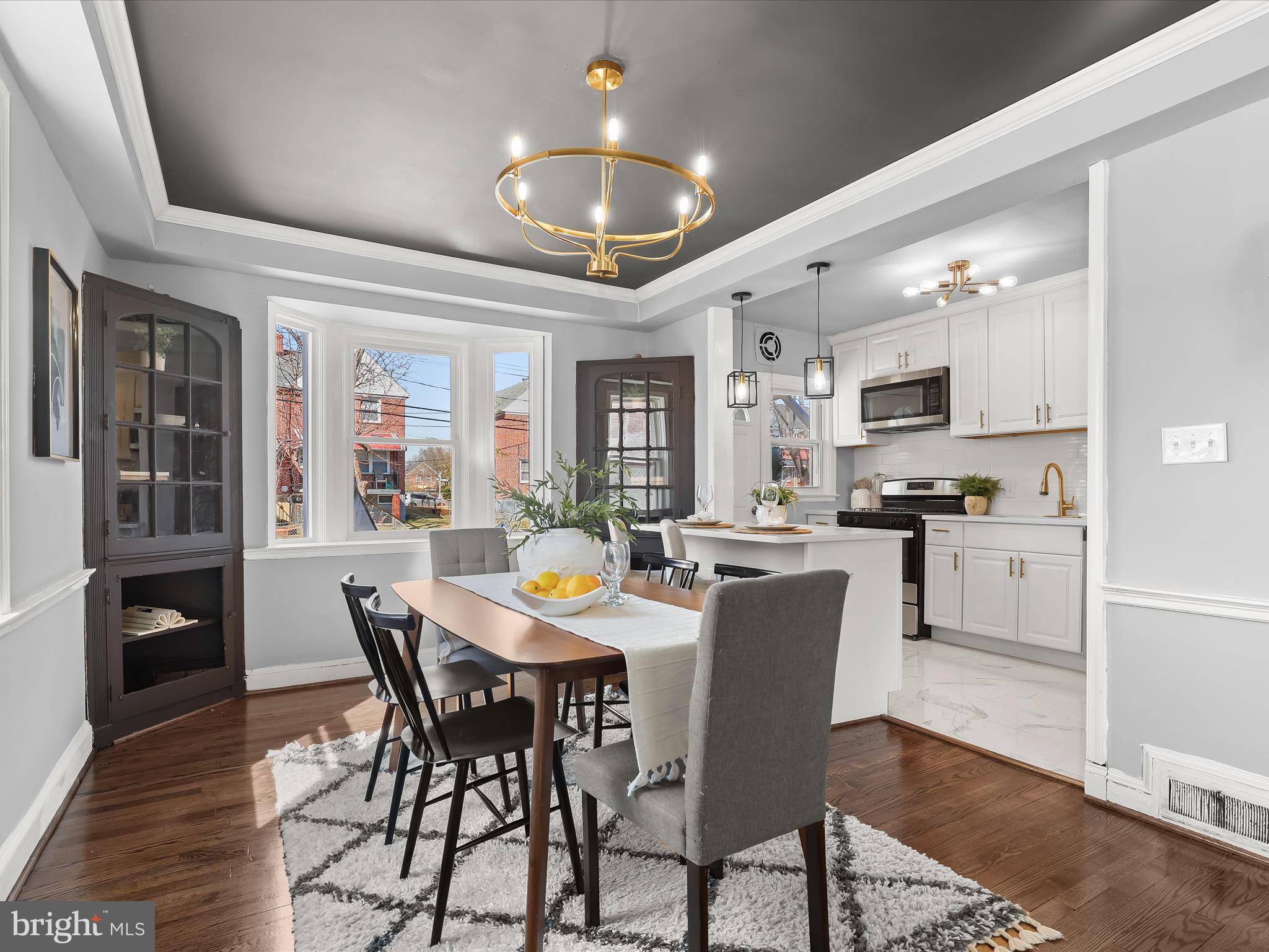 1350 Pentwood Road Baltimore, MD 21239 - Photo 12 of 37 a view of a dining room with furniture and wooden floor