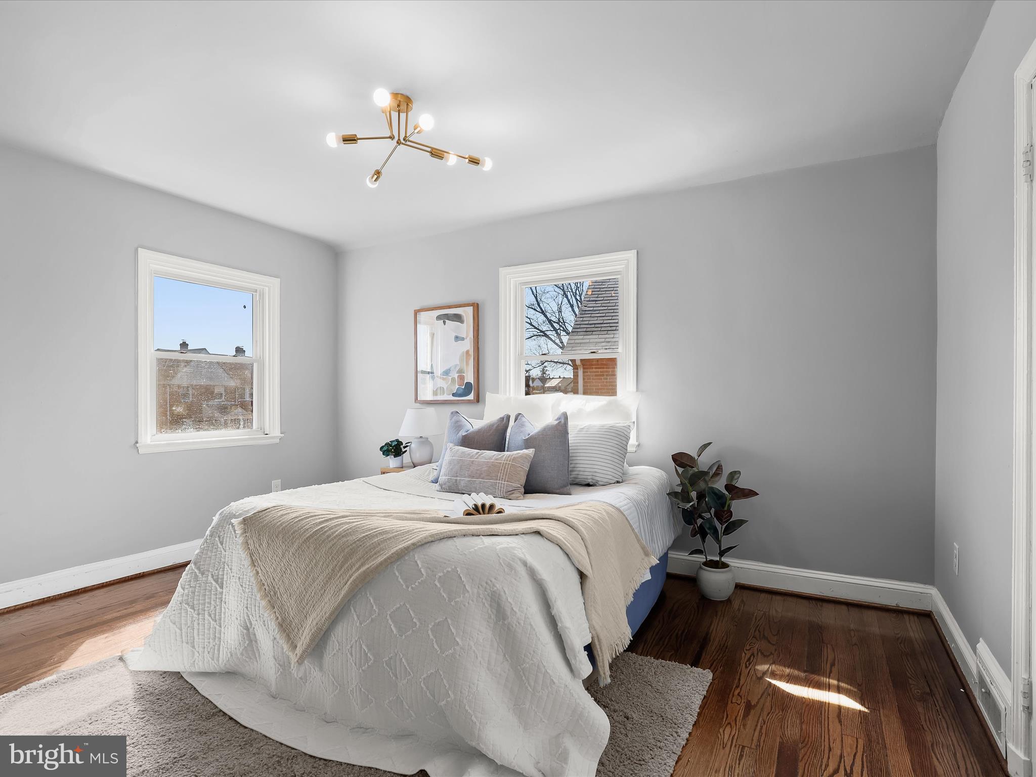 1350 Pentwood Road Baltimore, MD 21239 - Photo 19 of 37 a bedroom with a bed and a window