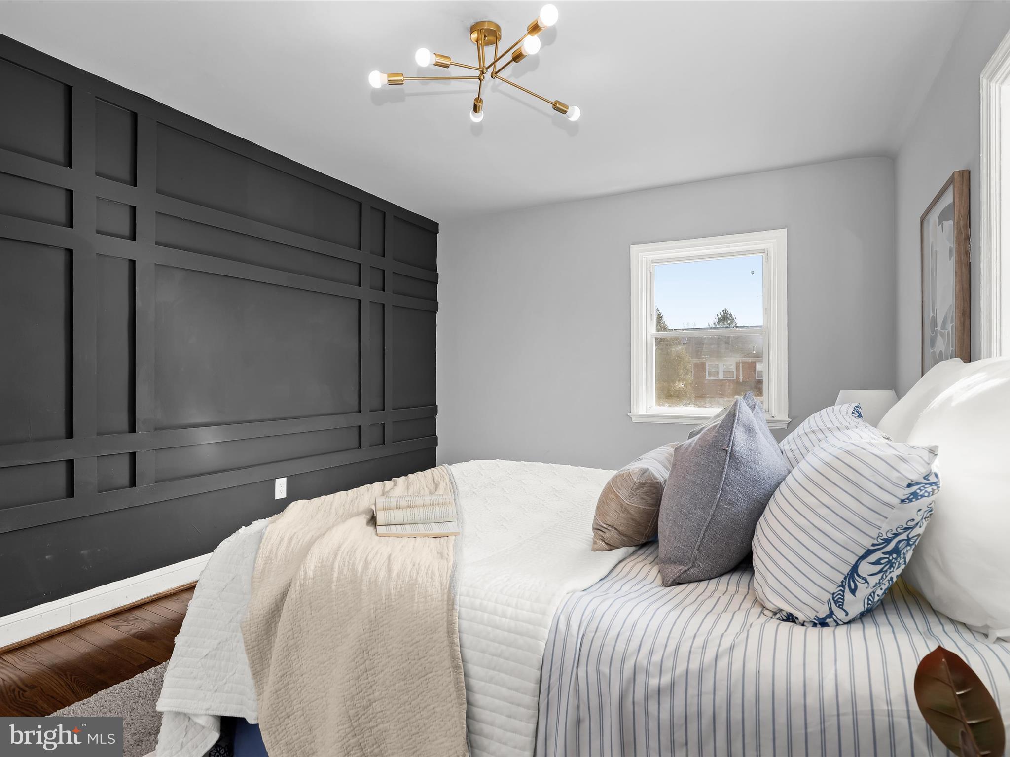 1350 Pentwood Road Baltimore, MD 21239 - Photo 21 of 37 a bedroom with a bed and window