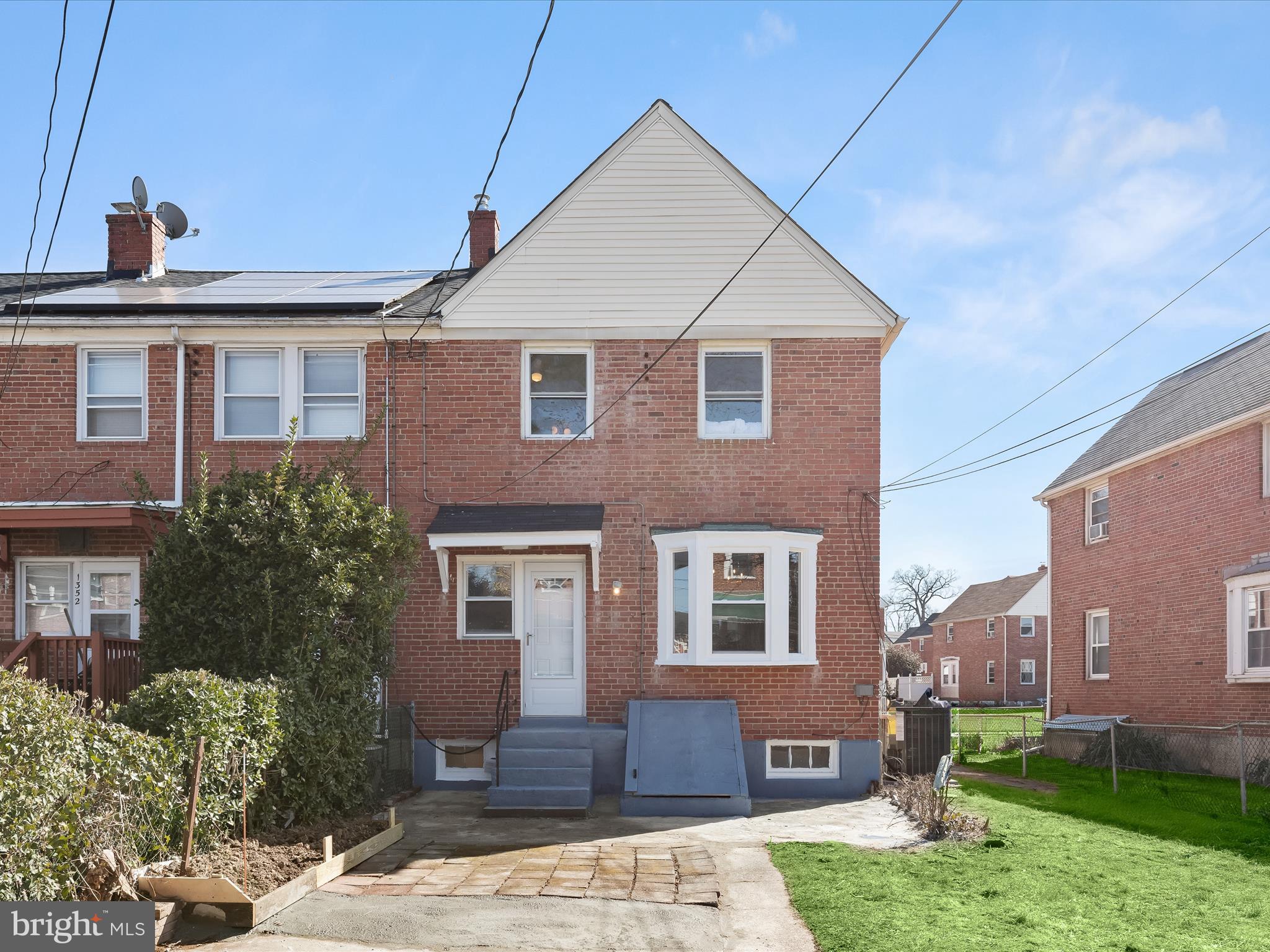 1350 Pentwood Road Baltimore, MD 21239 - Photo 33 of 37 a front view of a house with garden