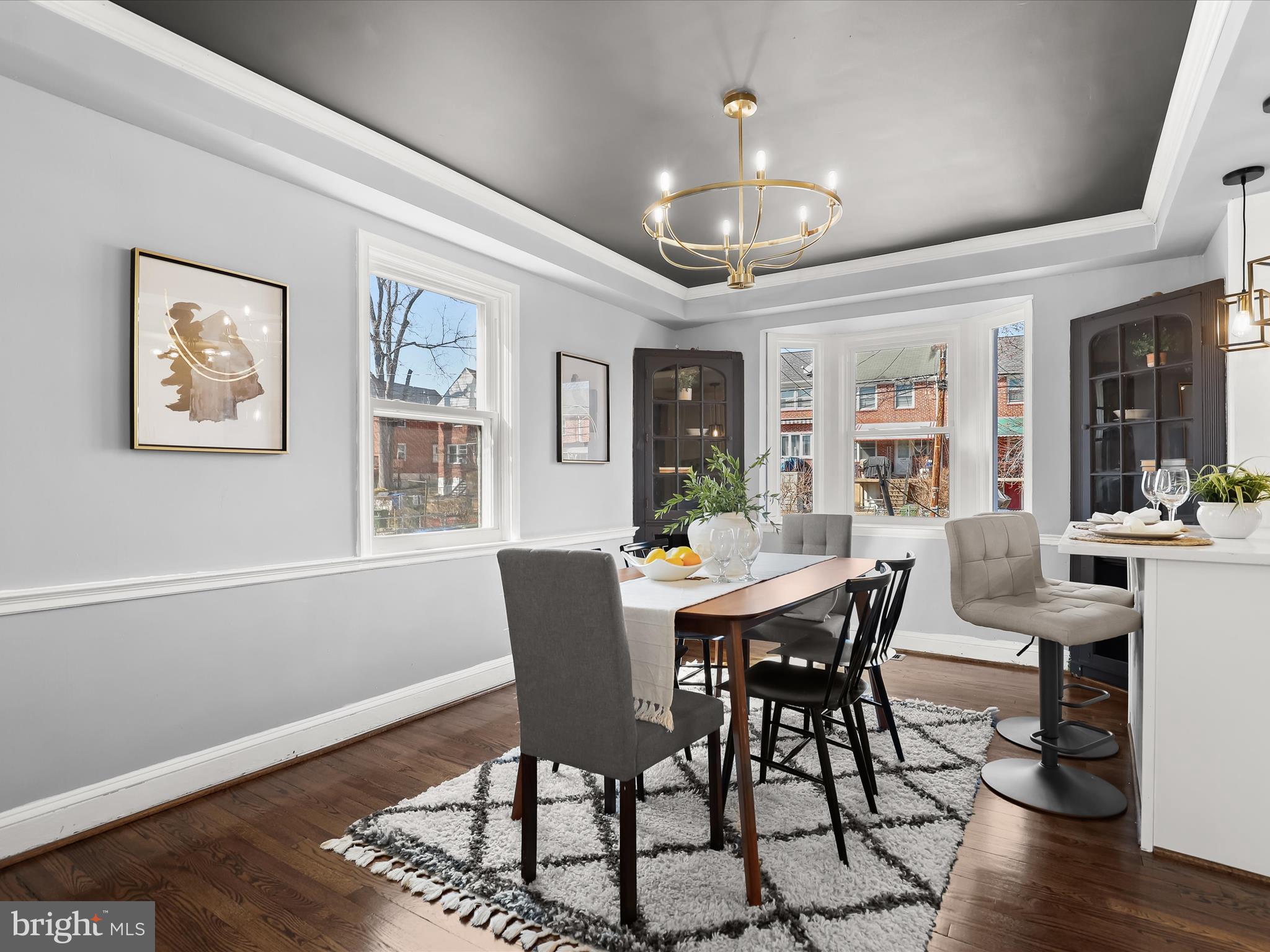 1350 Pentwood Road Baltimore, MD 21239 - Photo 10 of 37 a view of a dining room with furniture window and wooden floor