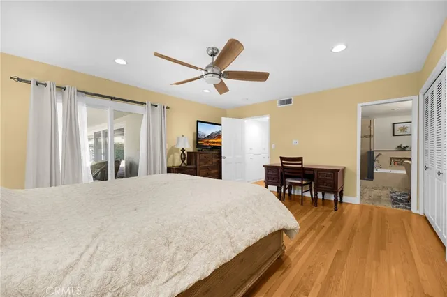 a bed room with a bed and furniture