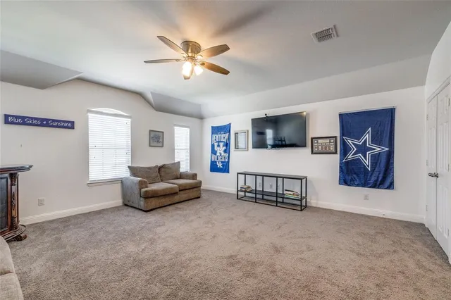 a living room with furniture and a table