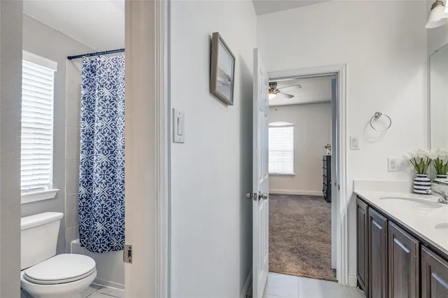 a bathroom with a sink double vanity and a mirror