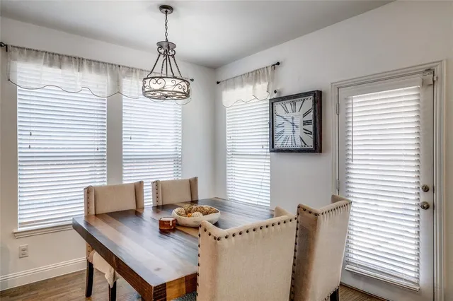 a workspace with furniture and window