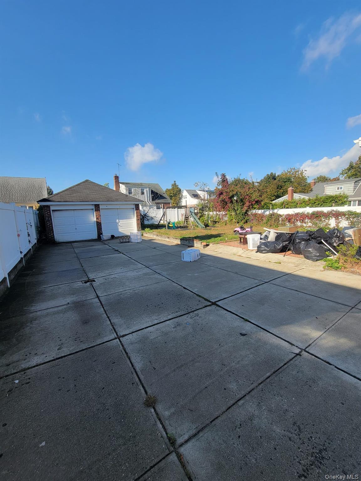 315 Mill Road Hewlett, NY 11557 - Photo 4 of 12 a view of a terrace with a water view