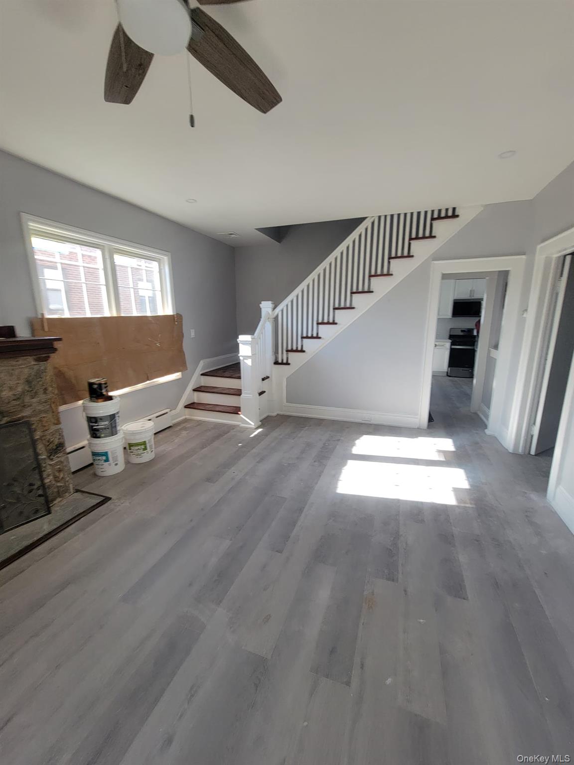 315 Mill Road Hewlett, NY 11557 - Photo 8 of 12 a view of entryway and hall with wooden floor
