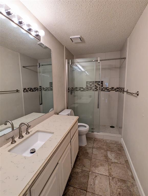 6019 Mapleshade Lane Dallas, TX 75252 - Photo 11 of 18 Secondary bathroom