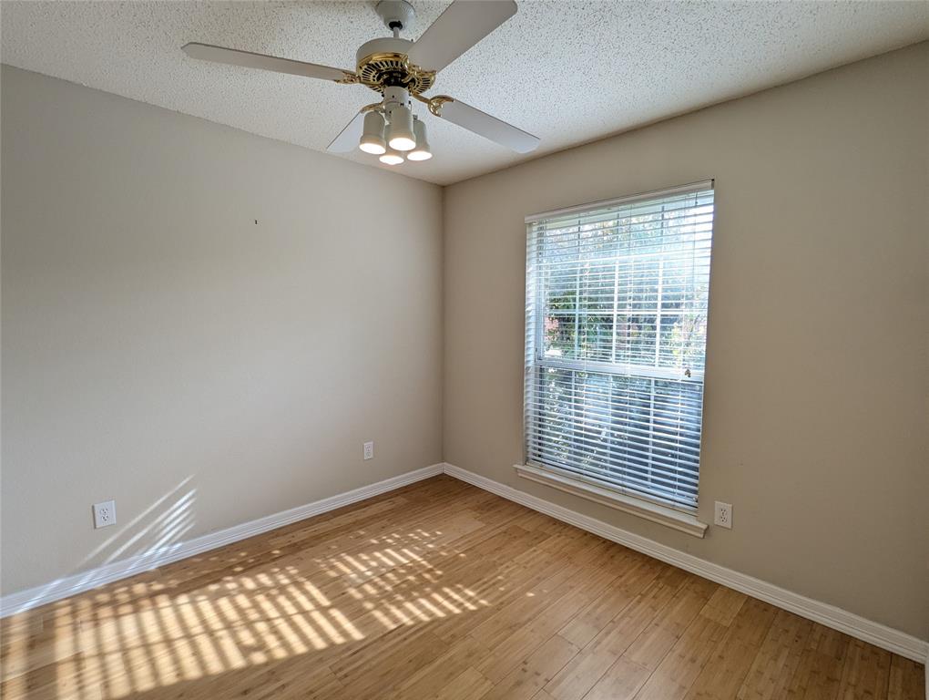 6019 Mapleshade Lane Dallas, TX 75252 - Photo 14 of 18 Secondary bedroom