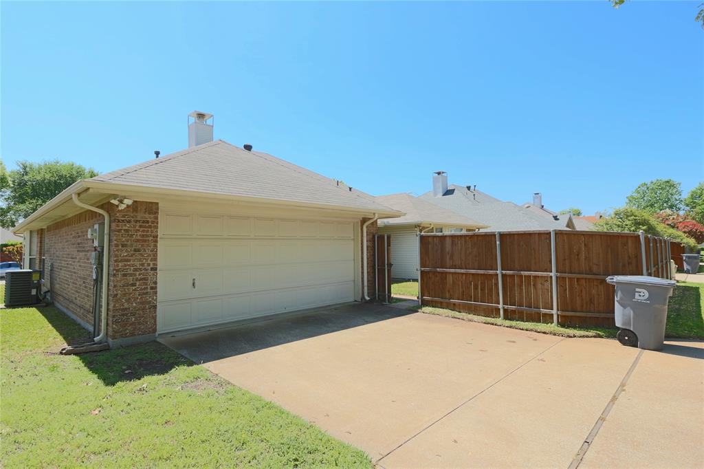 6019 Mapleshade Lane Dallas, TX 75252 - Photo 17 of 18 Rear garage