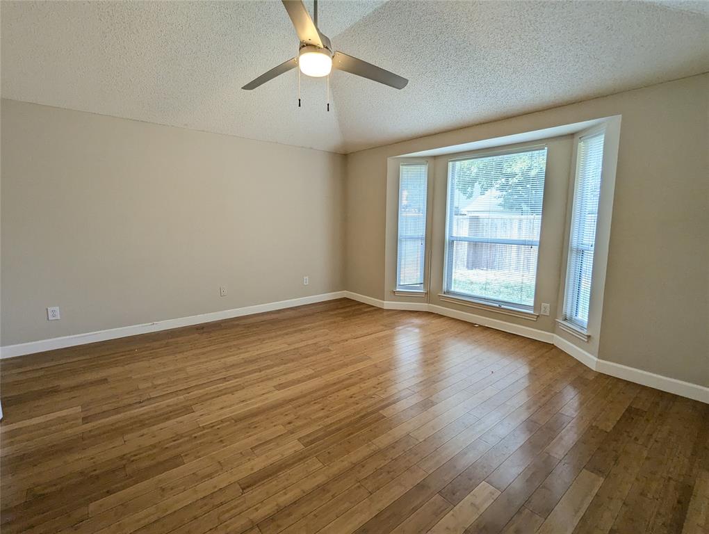 6019 Mapleshade Lane Dallas, TX 75252 - Photo 6 of 18 Primary bedroom