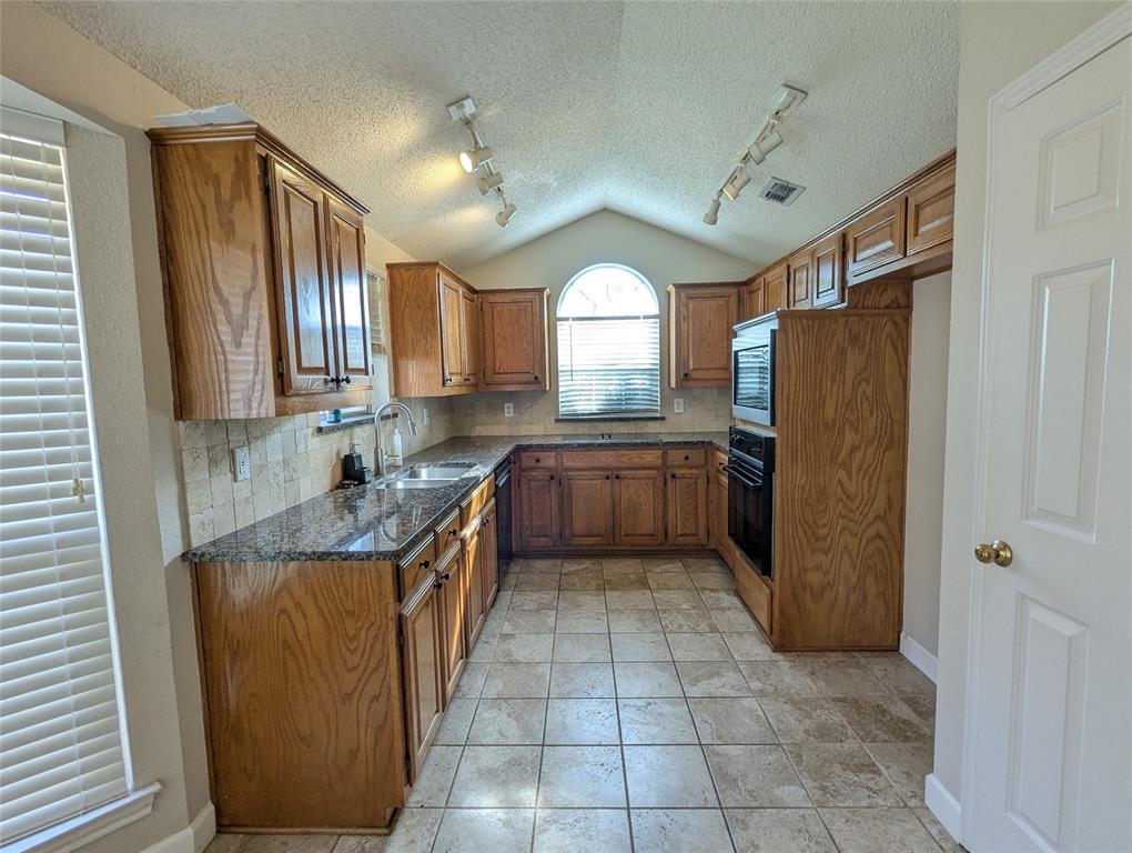 6019 Mapleshade Lane Dallas, TX 75252 - Photo 9 of 18 Kitchen