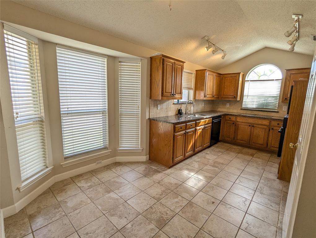 6019 Mapleshade Lane Dallas, TX 75252 - Photo 10 of 18 Kitchen