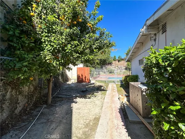 a view of balcony with wooden floor