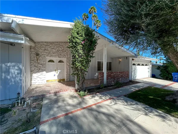 a house view with a outdoor space