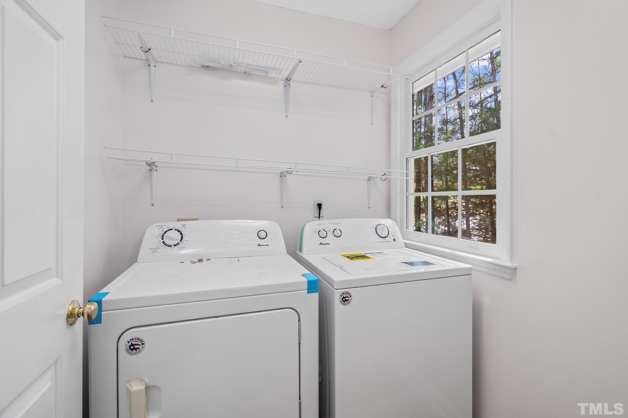 2201 Quail View Trail Raleigh, NC 27604 - Photo 13 of 28 a utility room with dryer and washer