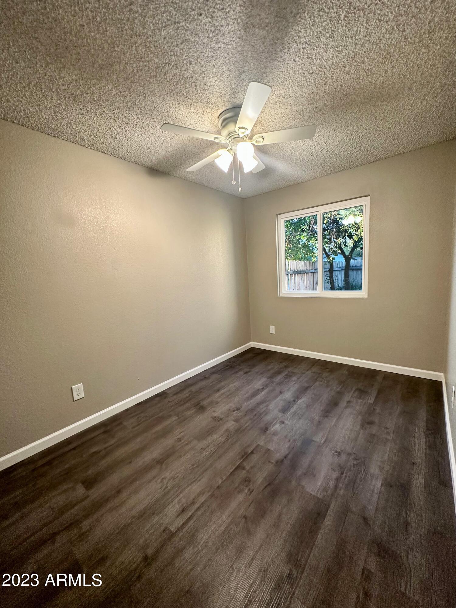 6711 West Osborn Road, Unit 117 Phoenix, AZ 85033 - Photo 6 of 17 Spacious Back Bedroom