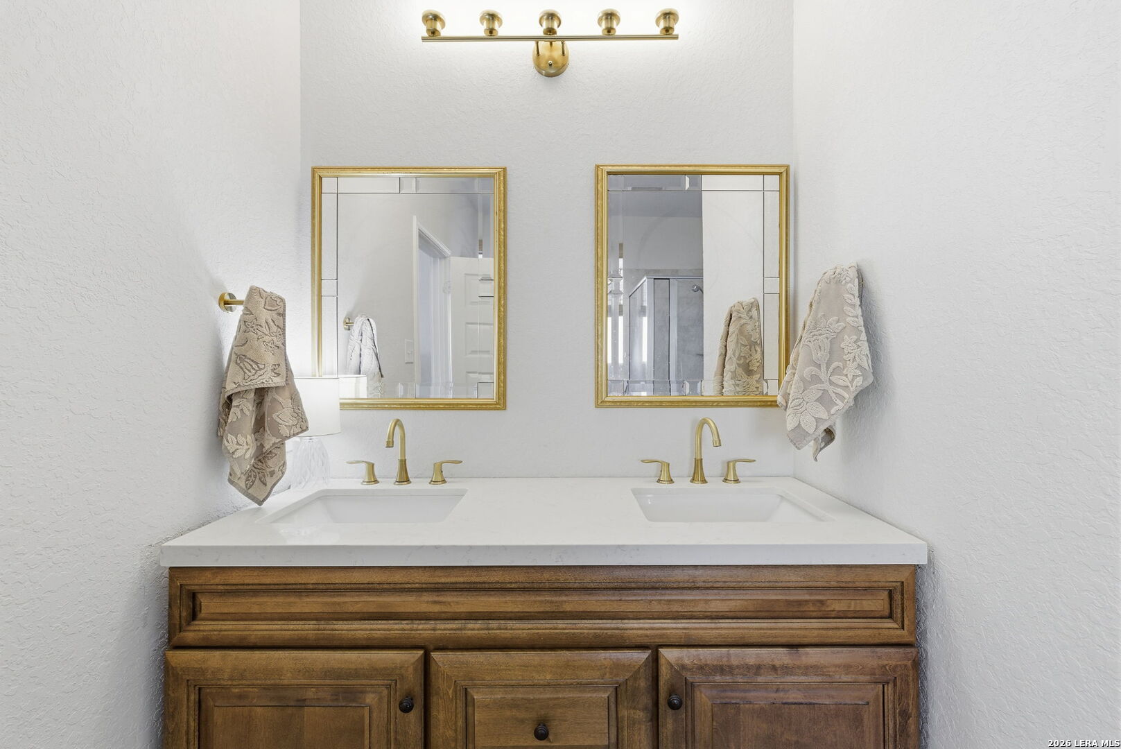 3410 Copper Acres Bulverde, TX 78163 - Photo 23 of 50 a bathroom with a sink and a mirror