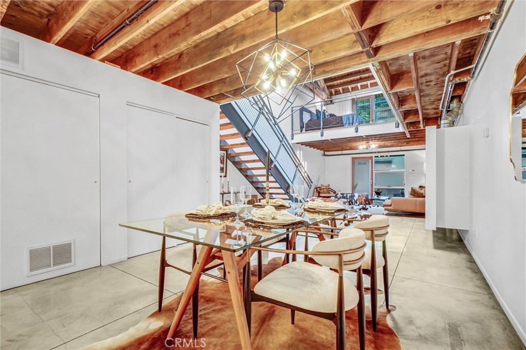 849 Pine Avenue, Unit C Long Beach, CA 90813 - Photo 14 of 63 a view of a table and chairs in patio