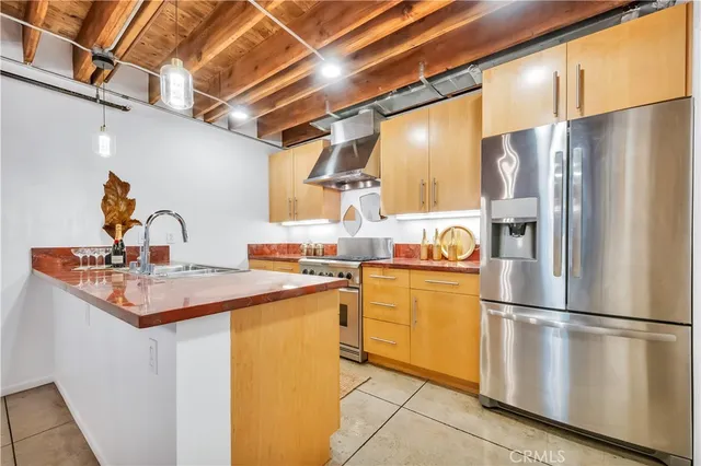 a kitchen with a stove and a sink