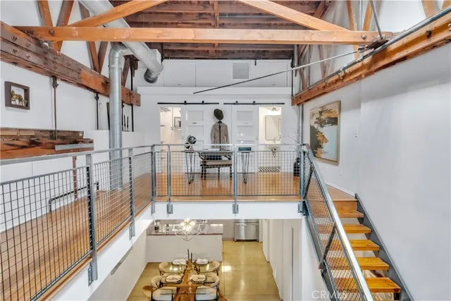 a bathroom with a sink mirror and toilet