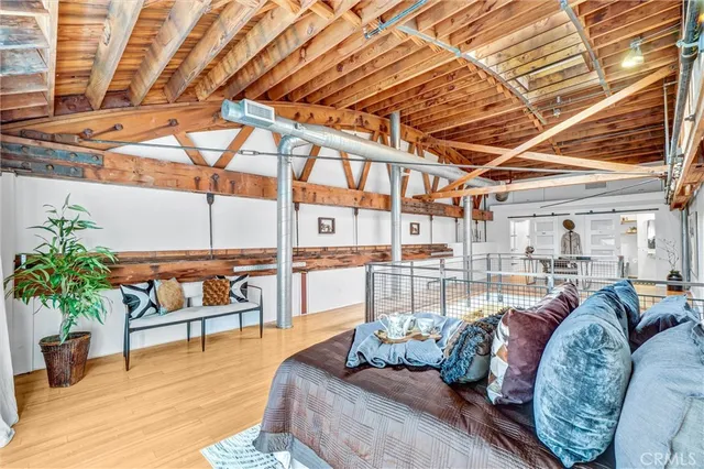 a view of a patio with a table and chairs and couches