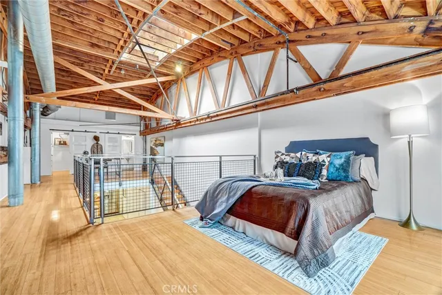 a view of balcony with two chairs and a potted plant