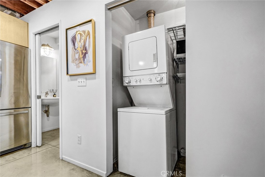 849 Pine Avenue, Unit C Long Beach, CA 90813 - Photo 40 of 63 a utility room with dryer and washer