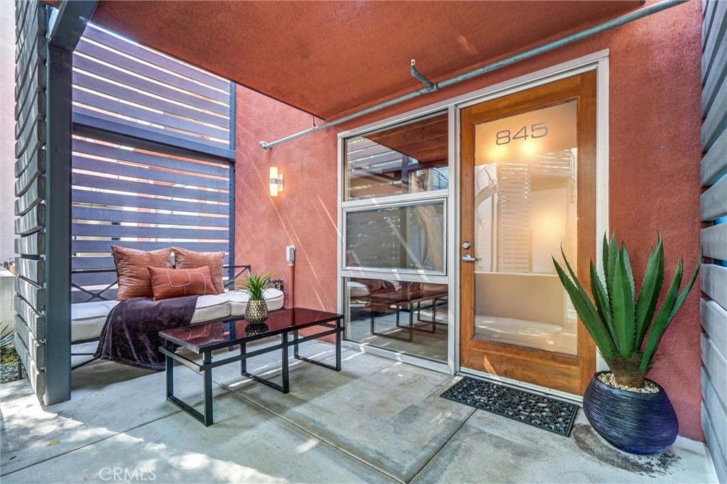 849 Pine Avenue, Unit C Long Beach, CA 90813 - Photo 48 of 63 a outdoor living space with furniture and a potted plant