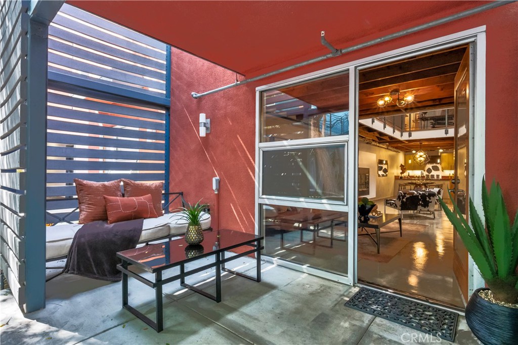 849 Pine Avenue, Unit C Long Beach, CA 90813 - Photo 49 of 63 a outdoor living space with patio furniture and potted plants