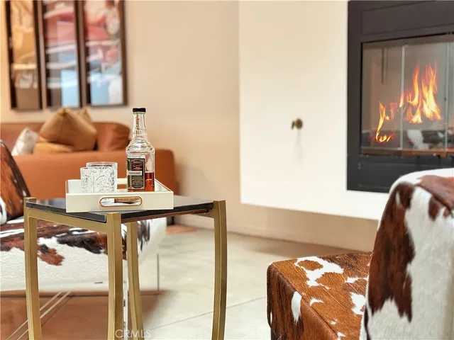 a kitchen with a table and chairs in it