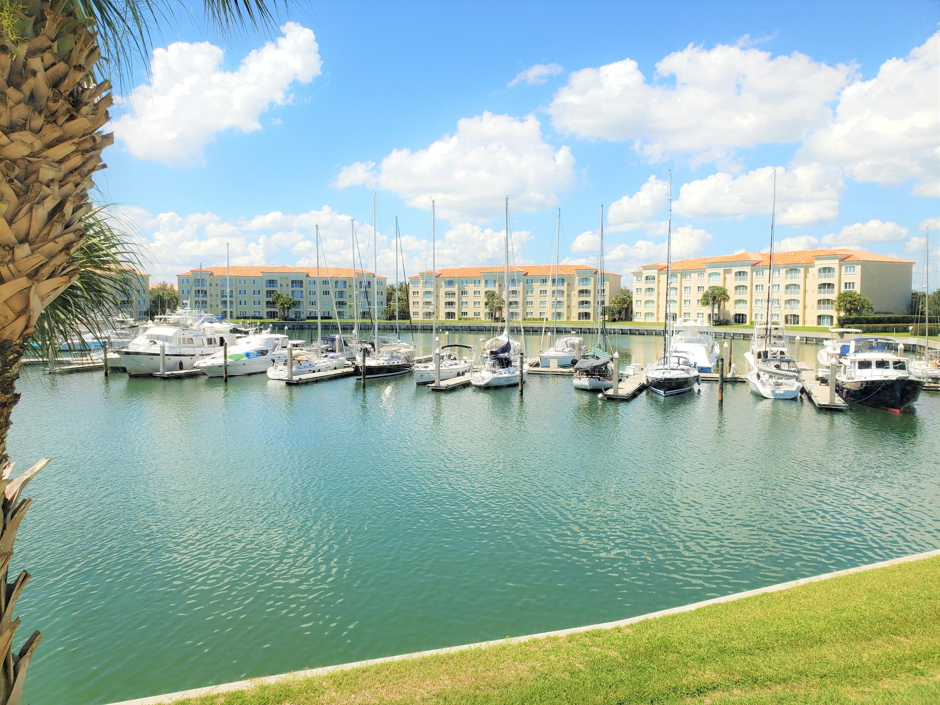 10 Harbour Isle Drive East, Unit 204 Fort Pierce, FL 34949 - Photo 14 of 20 a view of a lake with boats