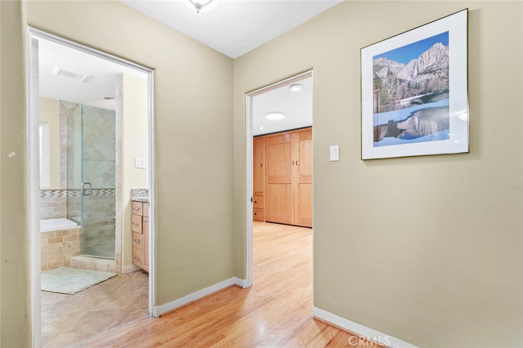 545 Spencer Street Glendale, CA 91202 - Photo 11 of 21 a view of a bathroom with wooden floor and shower